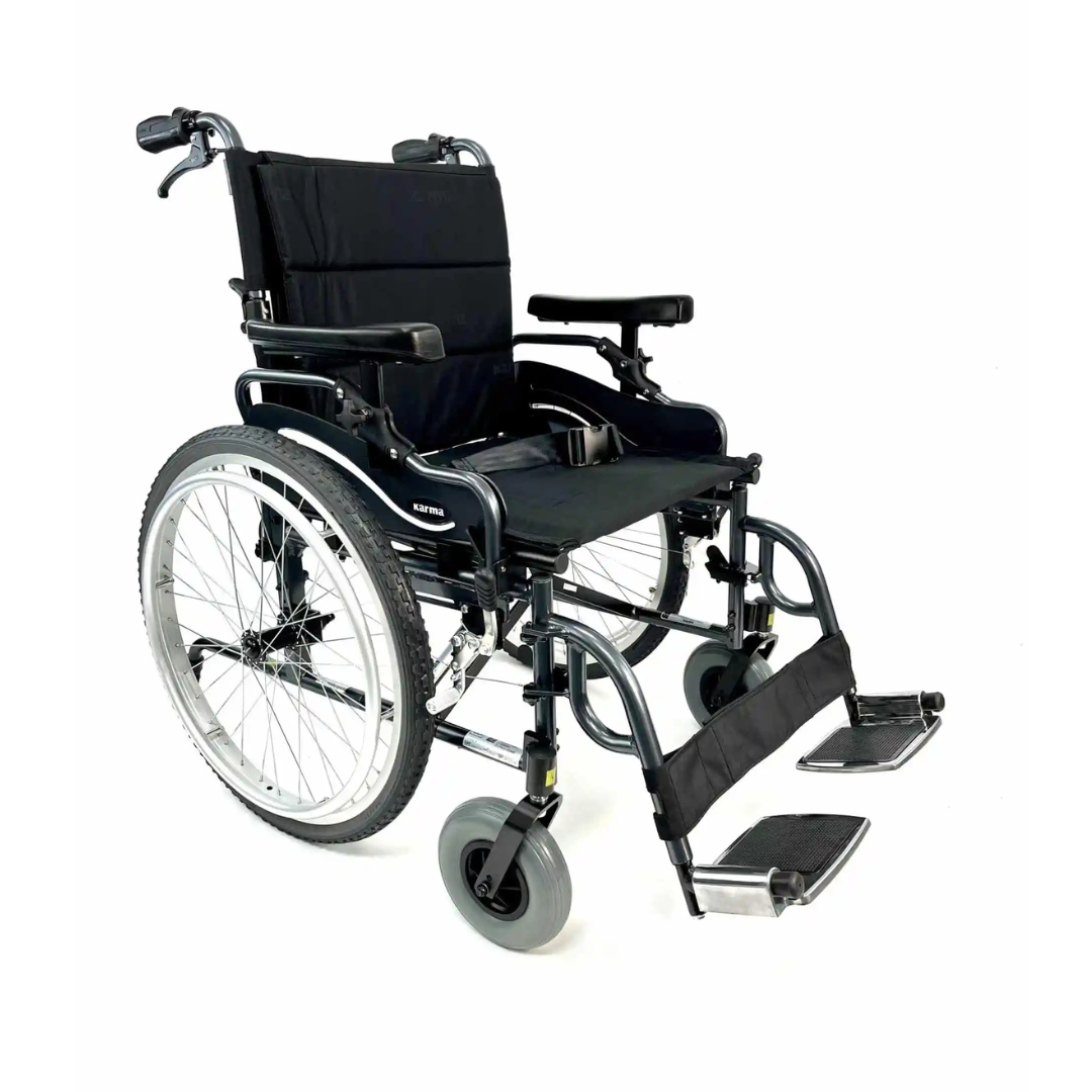 The Karman KM-8520X Bariatric Wheelchair – Lightweight Heavy Duty is shown in black with large rear wheels, padded armrests, and footrests against a plain white background.